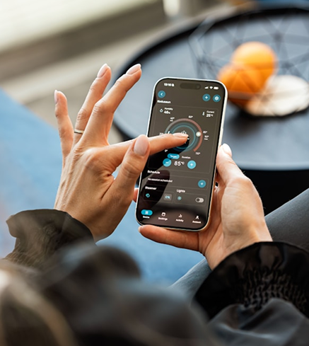 A person relaxing on a couch with a phone