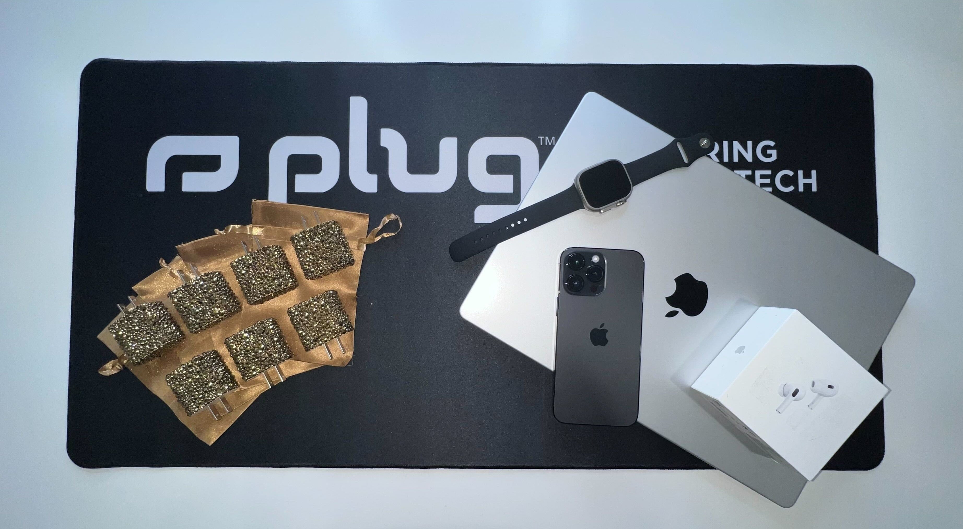 plug team holding golden plugs